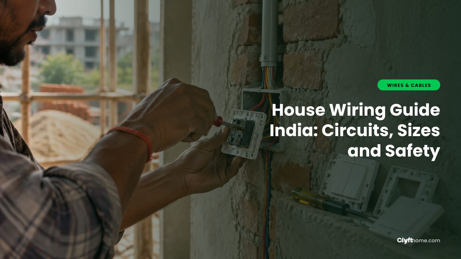 Electrician wiring a home distribution board with MCBs and copper cables
